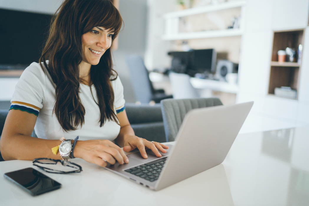 woman scrolling through content research