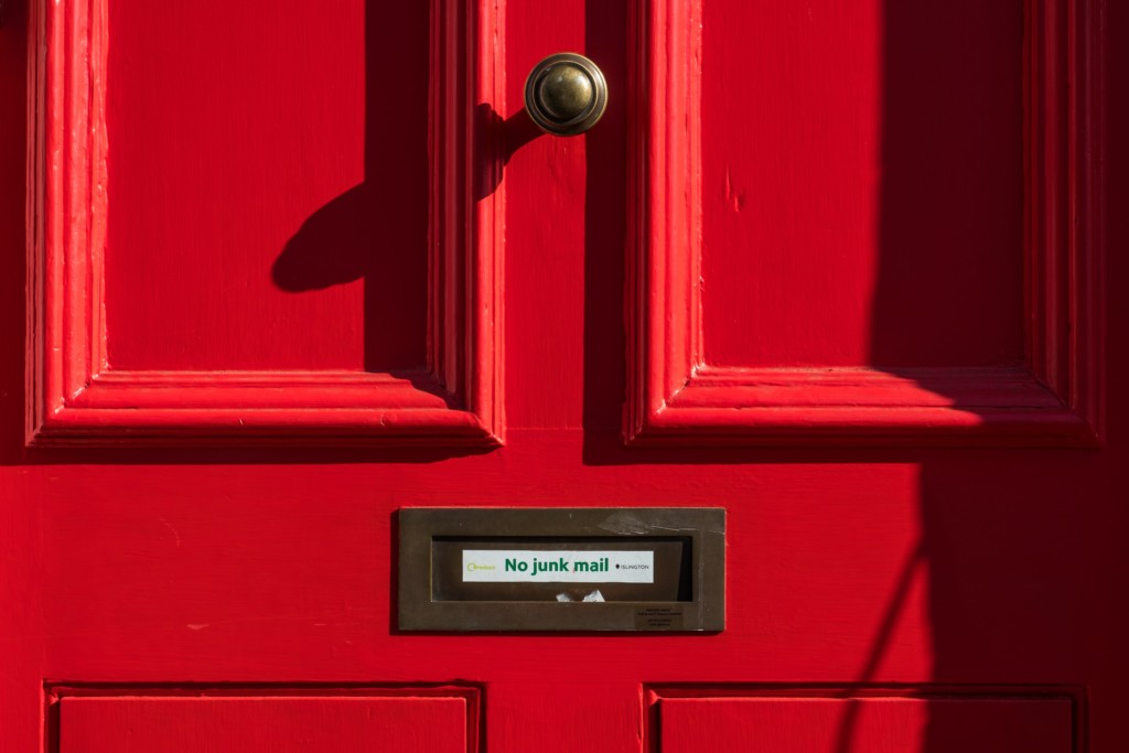 Red door showing a preference for no junk mail, showing a benefit of online brochure targeting