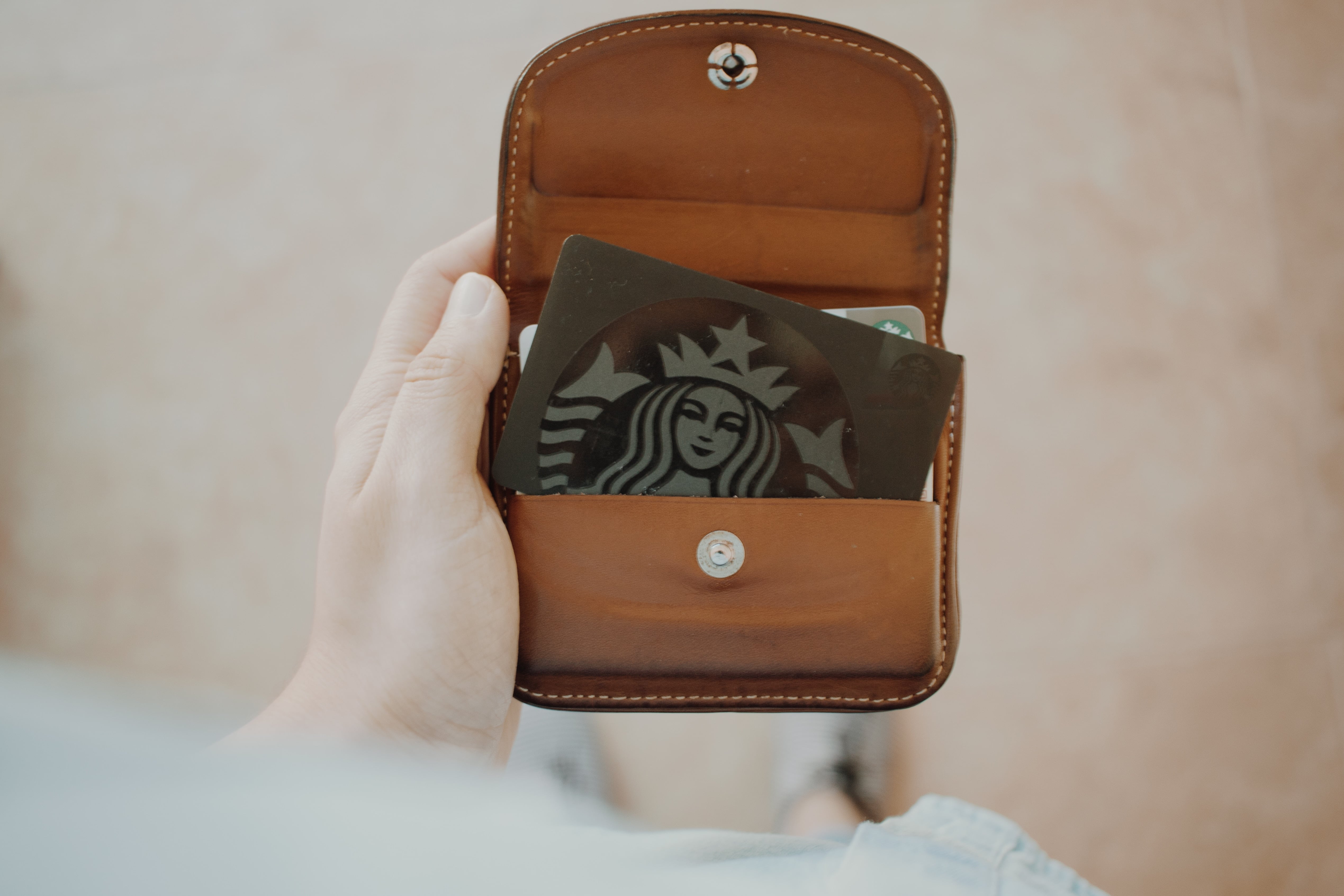 Starbucks loyalty card in a wallet