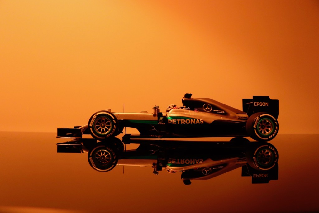marketing lessons from formula 1 - mercedes f1 car on orange background