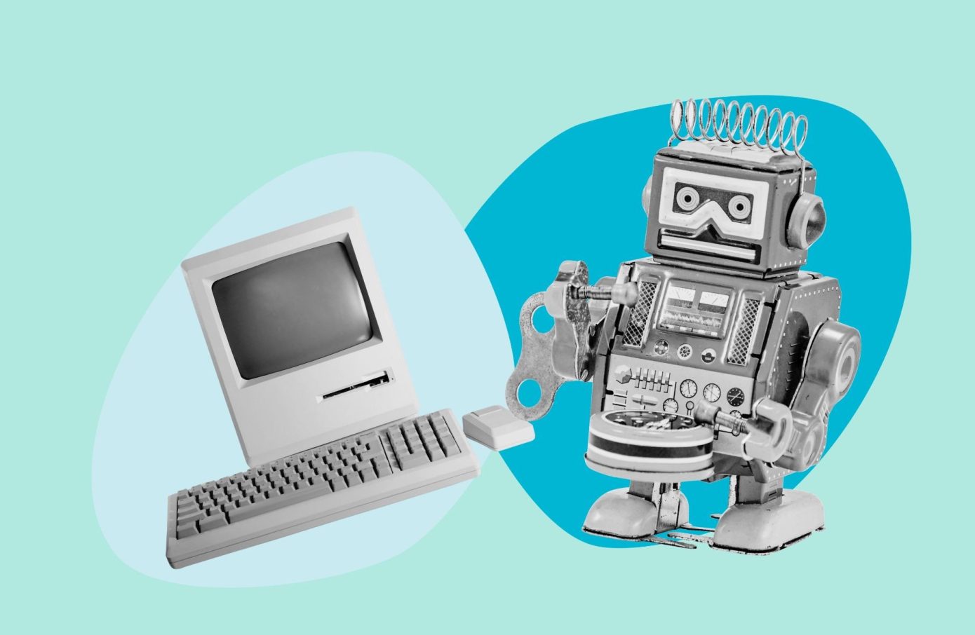 a vintage to robot and a vintage mac computer