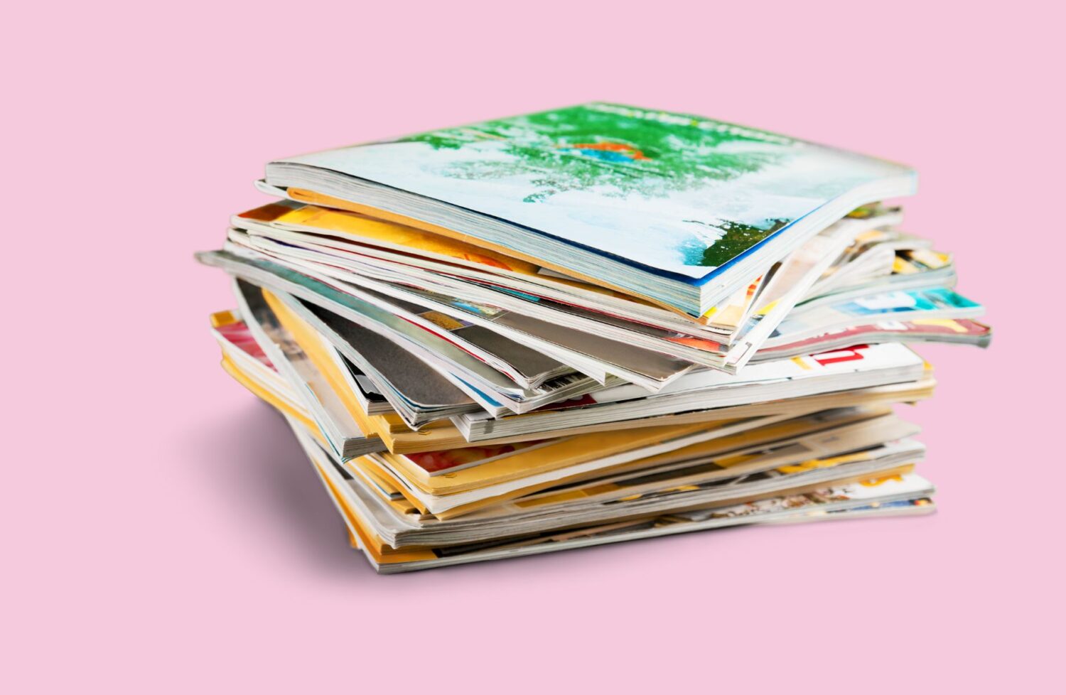 stack of printed magazines and brochures